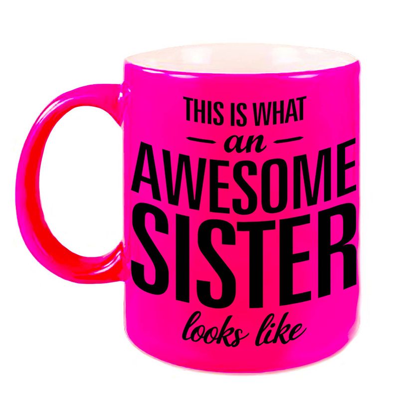 Foto van Awesome sister cadeau mok / beker neon roze voor zus 330 ml - feest mokken