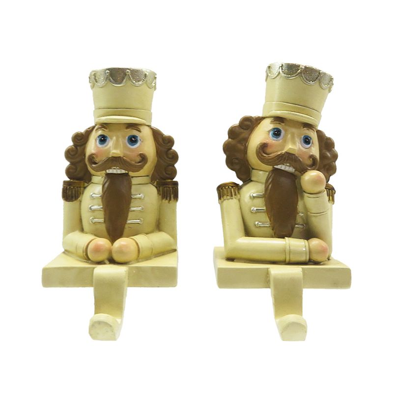 Foto van Clayre & eef haak kerstsok set van 2 notenkraker 12 cm beige bruin kunststof kerstdecoratie