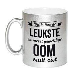 Foto van Zilveren leukste en meest geweldige oom cadeau koffiemok / theebeker 330 ml - feest mokken