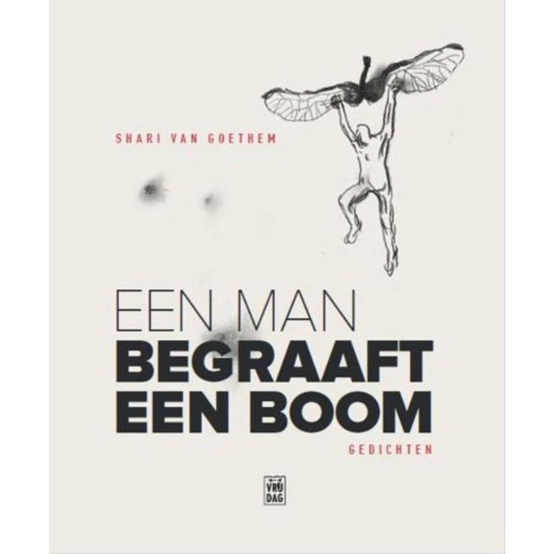 Foto van Een man begraaft een boom