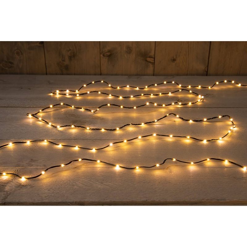 Foto van Anna'ss collection - wire chain 400l/12m led classic - 4m aanloopsnoer zwart - 4,5v/ip44 trafo met aan/ 8/16h timer/ui...