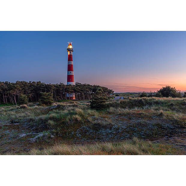 Foto van Spatscherm vuurtoren - 70x50 cm