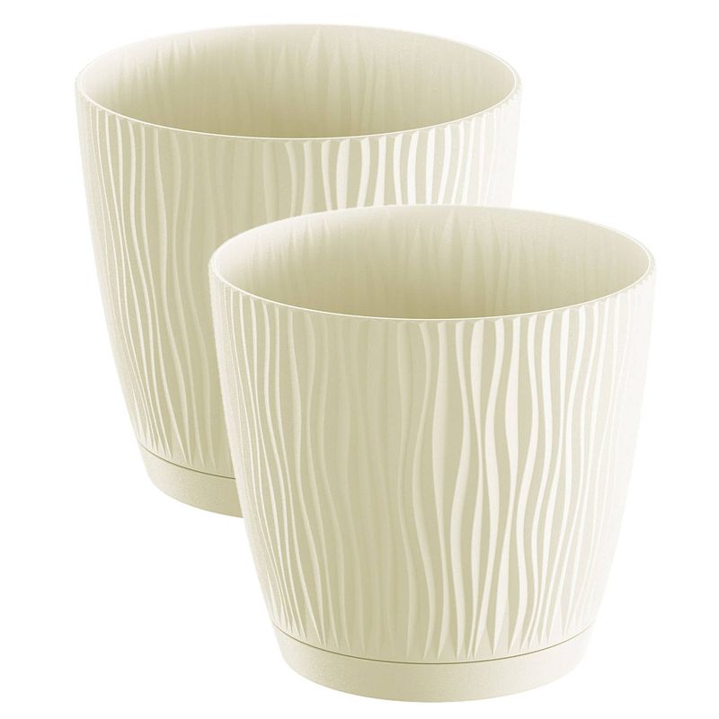 Foto van 2x stuks stijlvolle kunststof plantenpot/bloempot dia 28 cm/hoogte 26 cm waves creme wit - plantenpotten