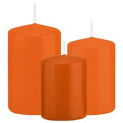 Foto van Stompkaarsen set van 3x stuks oranje 8-10-12 cm - stompkaarsen