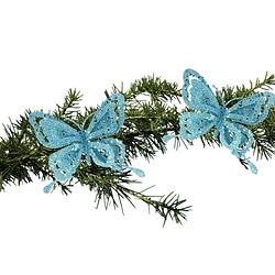 Foto van 2x stuks kerstboom decoratie vlinders op clip glitter blauw 14 cm - kersthangers