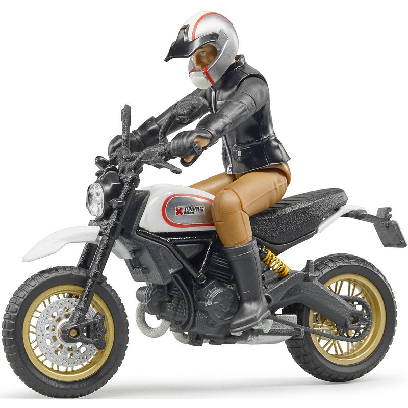 Foto van Ducati scrambler desert sled met bestuurder bruder