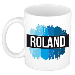 Foto van Naam cadeau mok / beker roland met blauwe verfstrepen 300 ml - naam mokken