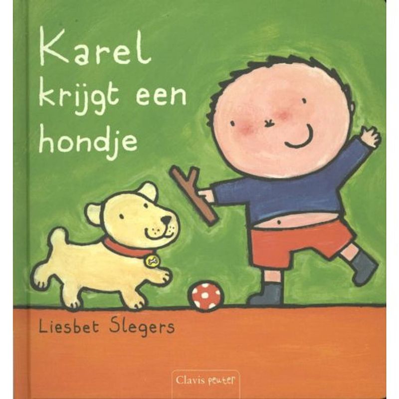 Foto van Karel krijgt een hondje