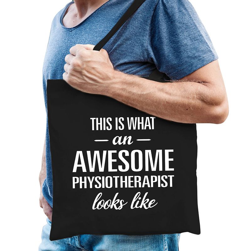 Foto van Awesome physiotherapist / geweldige fysiotherapeut cadeau tas zwart voor dames en heren - feest boodschappentassen