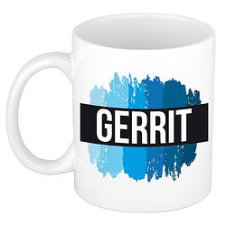 Foto van Naam cadeau mok / beker gerrit met blauwe verfstrepen 300 ml - naam mokken