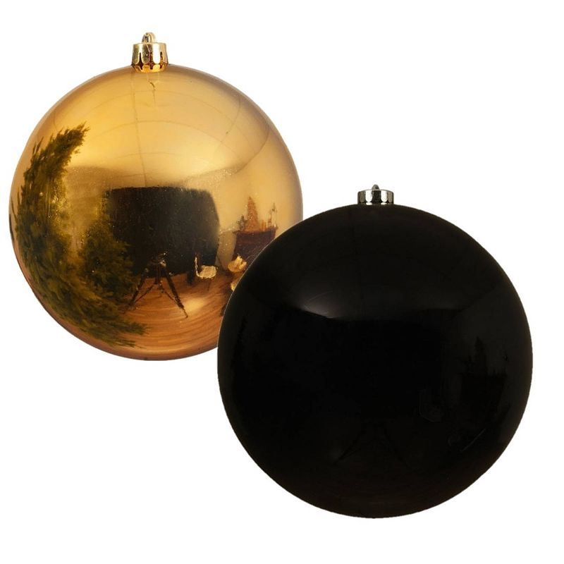 Foto van 2x stuks grote kerstballen van 20 cm glans van kunststof goud en zwart - kerstbal