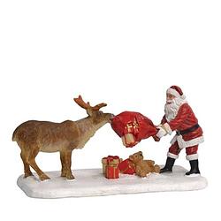 Foto van Luville reindeer teasing santa