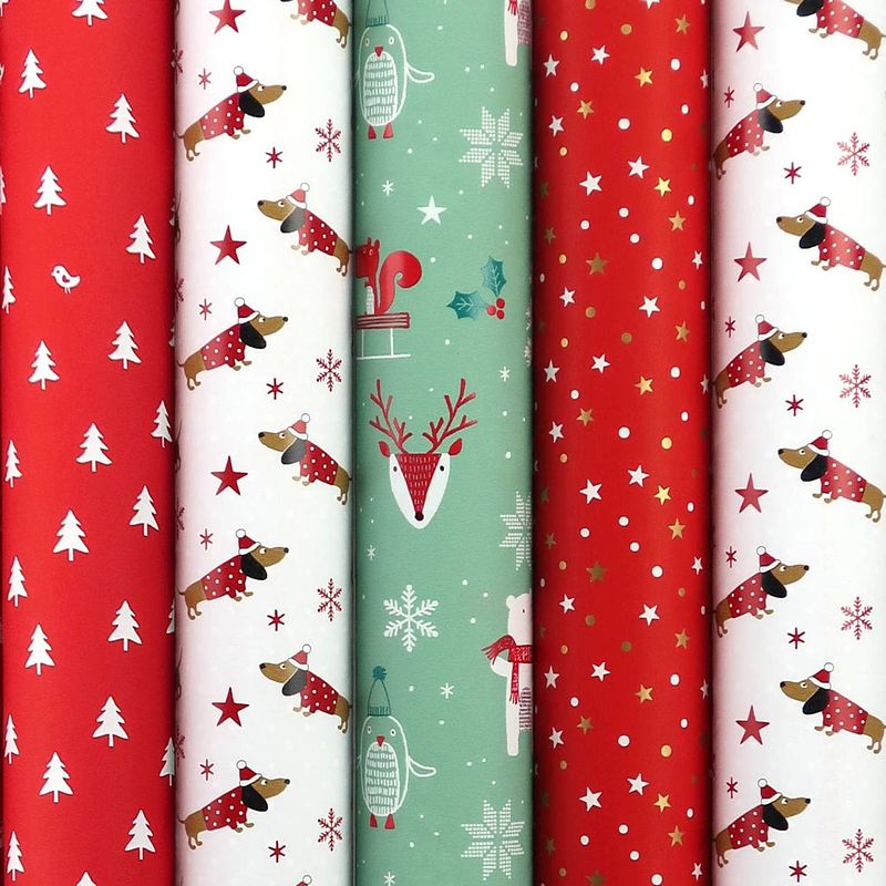 Foto van Santas helper assortiment cadeaupapier inpakpapier voor kerstmis - 2 meter x 70 cm - 5 rollen