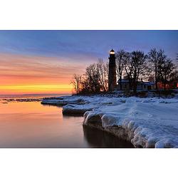 Foto van Inductiebeschermer - snowy lighthouse - 81.2x52 cm