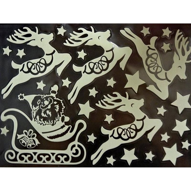 Foto van 2x kerst raamversiering glow in the dark raamstickers 29,5 x 40 cm - feeststickers