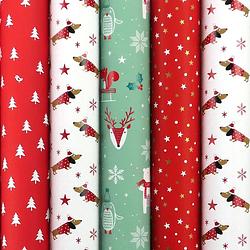 Foto van Santas helper assortiment cadeaupapier inpakpapier voor kerstmis - 2 meter x 70 cm - 5 rollen