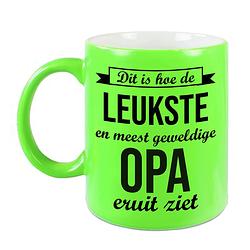 Foto van Leukste en meest geweldige opa cadeau koffiemok / theebeker neon groen 330 ml - feest mokken