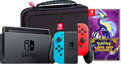Foto van Nintendo switch rood/blauw + pokémon violet + big ben travel case