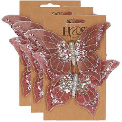 Foto van 6x stuks kunststof decoratie vlinders op clip roze 10 x 15 cm - kunstbloemen