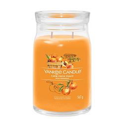 Foto van Yankee candle geurkaars large - met 2 lonten - farm fresh peach - 16 cm / ø 9 cm