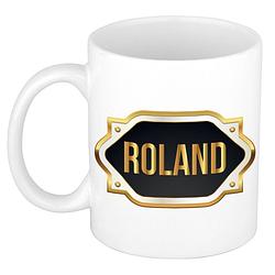 Foto van Naam cadeau mok / beker roland met gouden embleem 300 ml - naam mokken