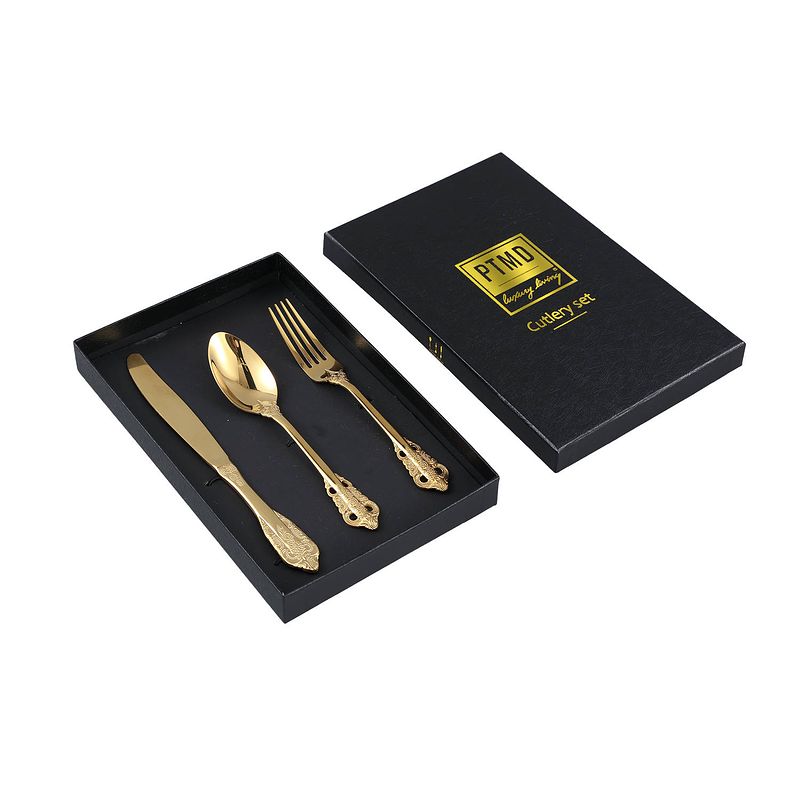 Foto van Ptmd thrust gold stainless steel cutlery set in giftbox