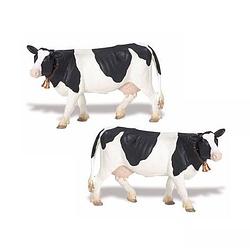 Foto van 2x stuks plastic speelgoed figuur holstein-friesian koeien 12 cm - speelfiguren