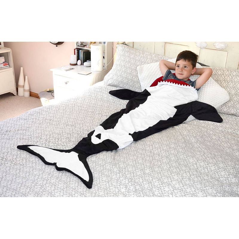 Foto van Snug-rug killer whale staart deken