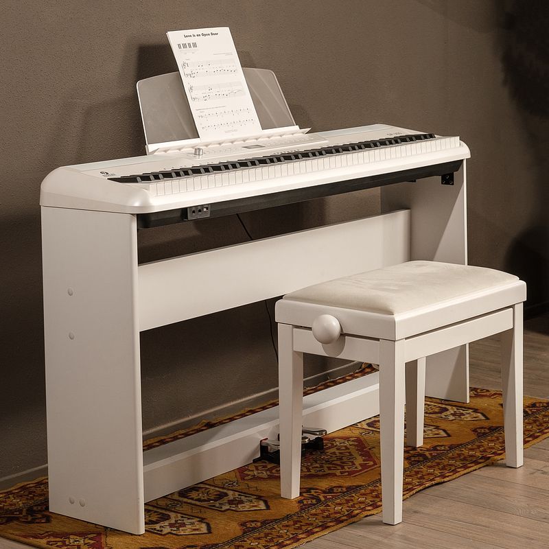 Foto van Fazley dp-250-wh digitale piano met onderstel en pianobank wit