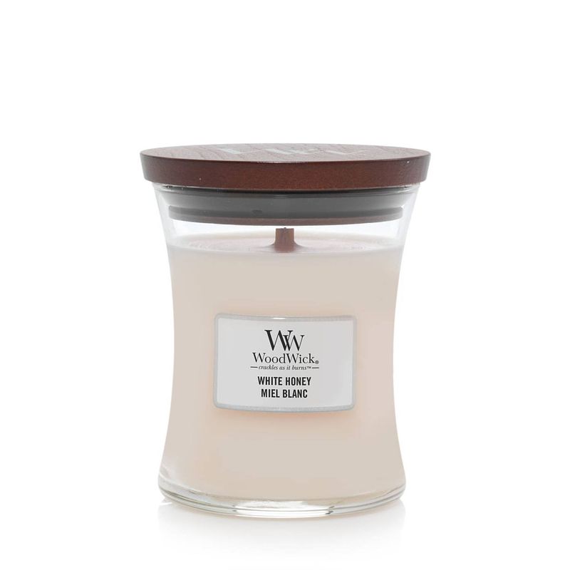 Foto van Woodwick medium candle white honey