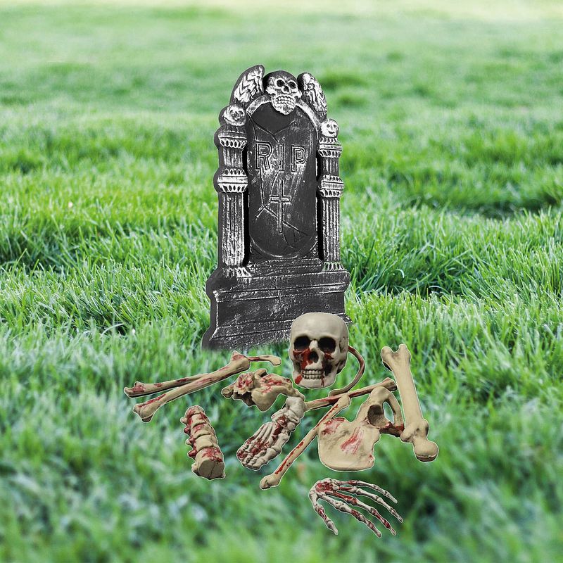 Foto van Halloween horror tuin decoratie set kerkhof met grafsteen en bloederige botten - feestdecoratievoorwerp