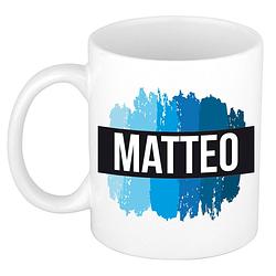 Foto van Naam cadeau mok / beker matteo met blauwe verfstrepen 300 ml - naam mokken