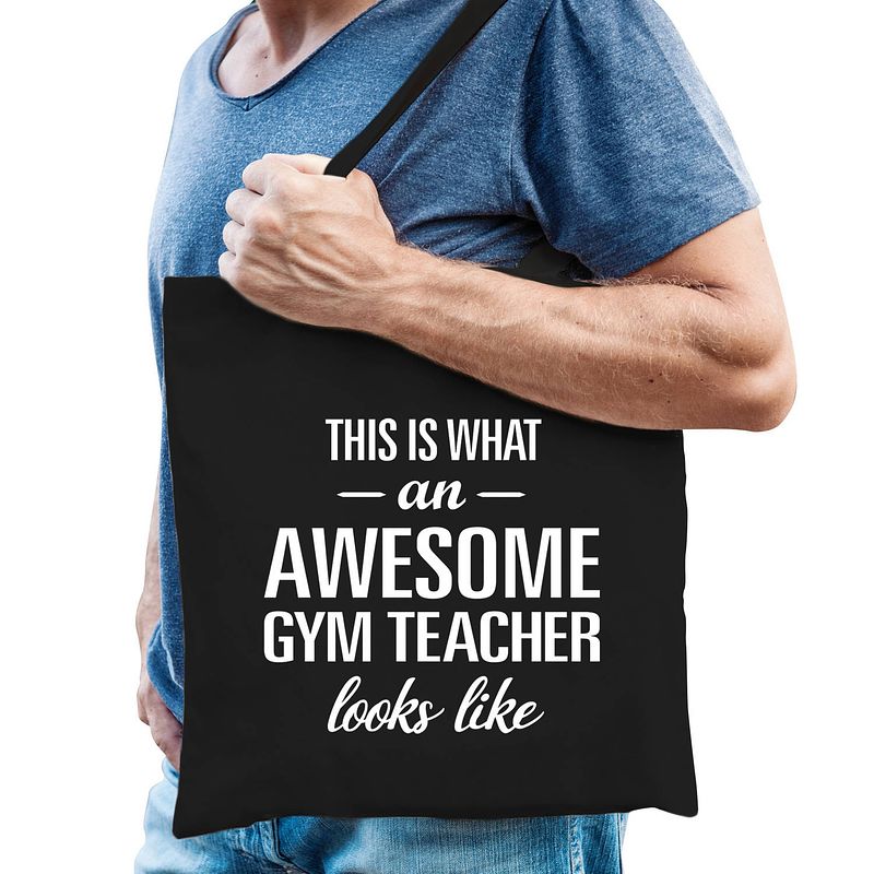 Foto van Awesome gym teacher / geweldige gymleraar / gymlerares cadeau tas zwart voor dames en heren - feest boodschappentassen