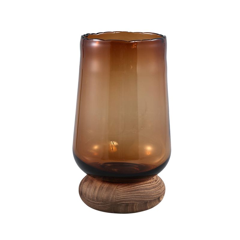 Foto van Ptmd jessey brown glass vase on wooden foot l