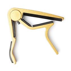 Foto van Dunlop 84fg trigger capo acoustic flat gold capo voor klassieke gitaar