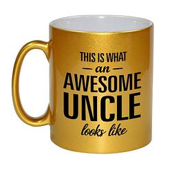 Foto van Awesome uncle / oom gouden cadeau mok / beker 330 ml - feest mokken