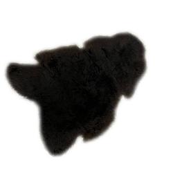 Foto van Ptmd furry black shaped sheepskin plaid