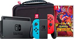 Foto van Nintendo switch rood/blauw + pokémon scarlet + big ben travel case