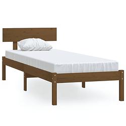 Foto van The living store houten bedframe - eenpersoonsbed 100x200 cm - massief grenenhout - honingbruin - inclusief hoofdeinde