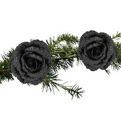 Foto van 2x stuks kerstboom bloemen op clip zwart glitter 18 cm - kunstbloemen