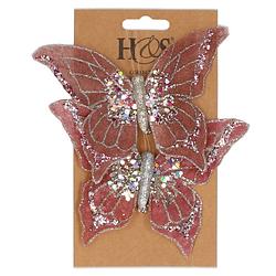 Foto van 2x stuks kunststof decoratie vlinders op clip roze 10 x 15 cm - kunstbloemen