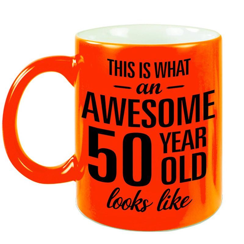 Foto van Awesome 50 year cadeau mok / beker neon oranje 330 ml - feest mokken