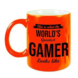 Foto van Worlds greatest gamer cadeau koffiemok / theebeker neon oranje 330 ml - feest mokken