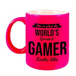 Foto van Worlds greatest gamer cadeau koffiemok / theebeker neon roze 330 ml - feest mokken