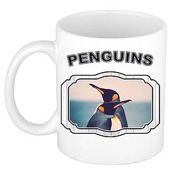 Foto van Dieren pinguin beker - penguins/ pinguins mok wit 300 ml - feest mokken