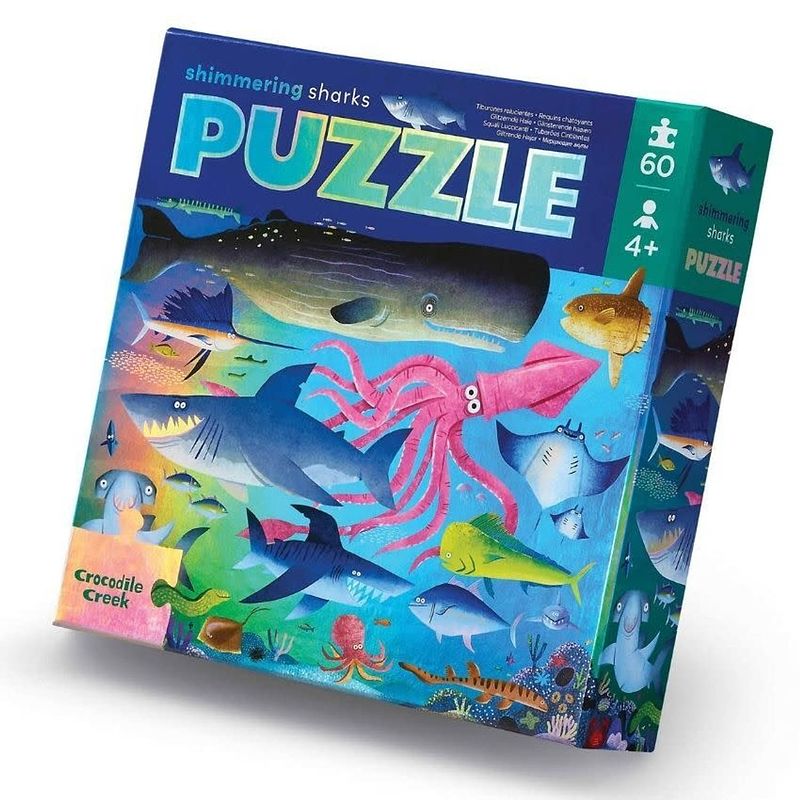 Foto van Crocodile creek puzzel shimmering sharks - 60 stukjes