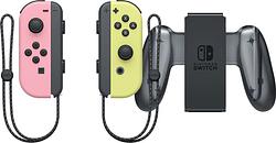 Foto van Nintendo switch joy-con pastel set roze/geel + nintendo switch joy-con charge grip