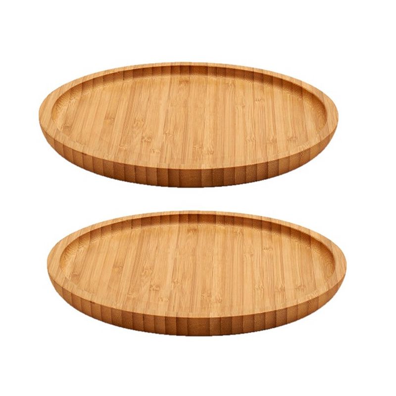 Foto van 2x stuks bamboe houten broodplanken/serveerplanken/hamplanken rond 20 cm - serveerplanken