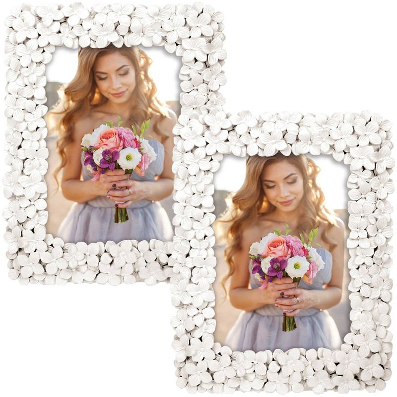 Foto van 2x stuks kunststof fotolijst witte bloemen geschikt voor een foto van 13 x 18 cm - fotolijsten