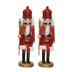 Foto van 2x stuks kerstbeeldjes kunststof notenkraker poppetjes/soldaten rood 28 cm kerstbeeldjes - kerstbeeldjes